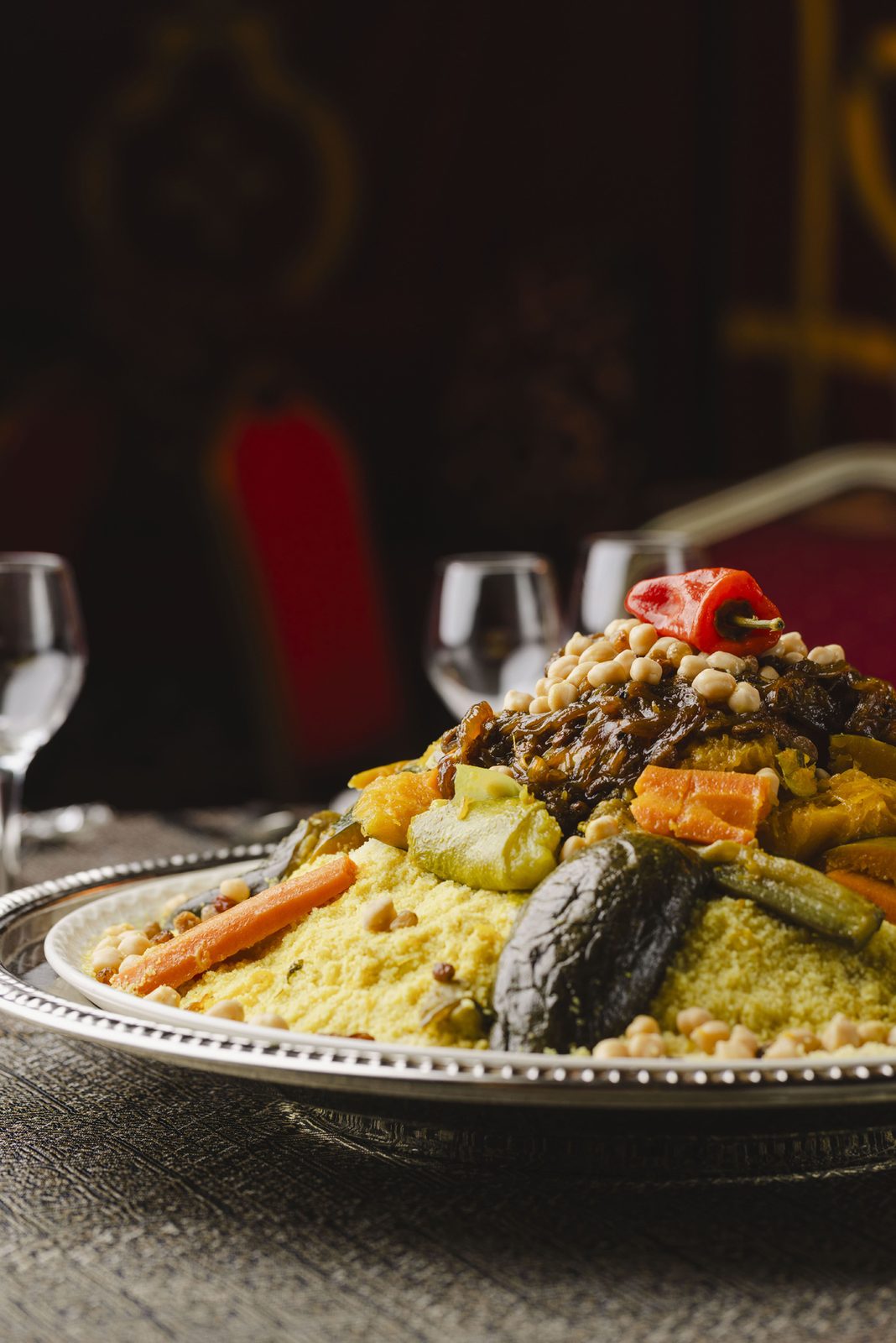 Couscous with vegetables served at the table at Chez Ali